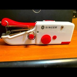 Singer hand held sewing machine , portable